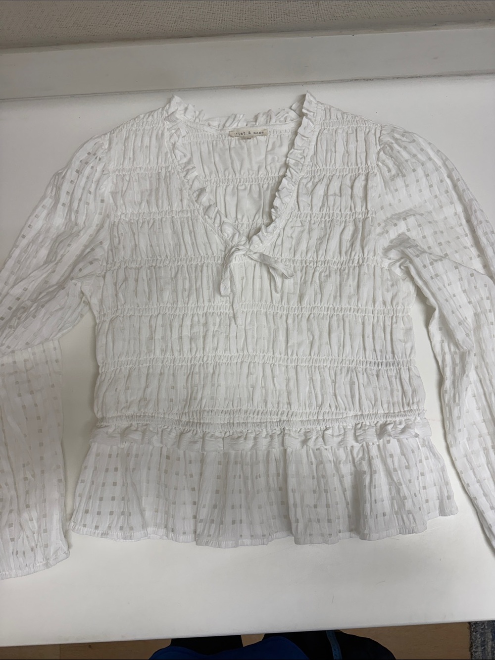 Smocked White Ruffle Peplum Blouse with Tie Neck